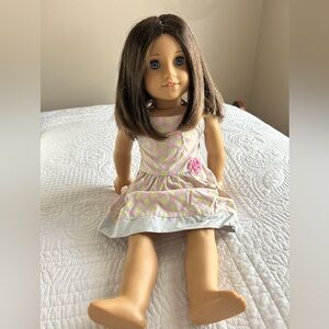 American girl Doll with Brown Hair and Pink Dress